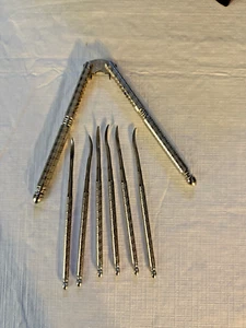 Vintage HMQ Metall Hand Nussknacker mit Plektren 7 Stück - Bild 1 von 2