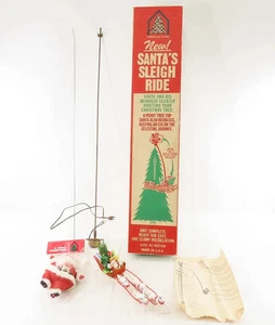 Vintage Weihnachtshaus Weihnachtsmann Schlittenfahrt umkreisender Baumaufsatz mit Box - Bild 1 von 20