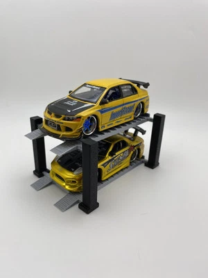 1:64 Scale 4 Post Diecast Garage Lift Display 2 tier - Image 1 of 4