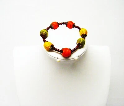 Pulseira boho redonda de miçangas cobertas de tecido laranja/amarelo/verde - Imagem 1 de 4