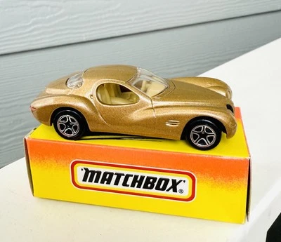 1996 MATCHBOX SUPERFAST #11 GOLD CHRYSLER ATLANTIC NEW IN BOX 1/64 SCALE - Image 1 of 4