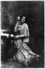 Mrs Patrick Campbell,Beatrice Stella Tanner,actress,table,holding pet dog,c1901