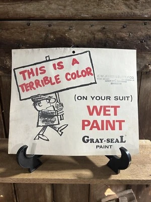 Letrero vintage de cartulina con pintura de sello gris Foto 1 de 4