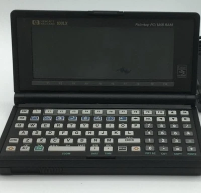 HP 100LX 1 MB RAM Palmtop PC - Handheld - DOS PDA Pocket PC (F1020A#ABA) - Image 1 of 4