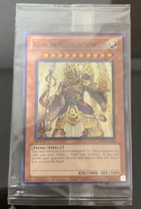Yu-Gi-Oh Aggiba, the Malevolent Sh'nn S'yo 2010-AE003 Super R English Yugioh WCS - Picture 1 of 2