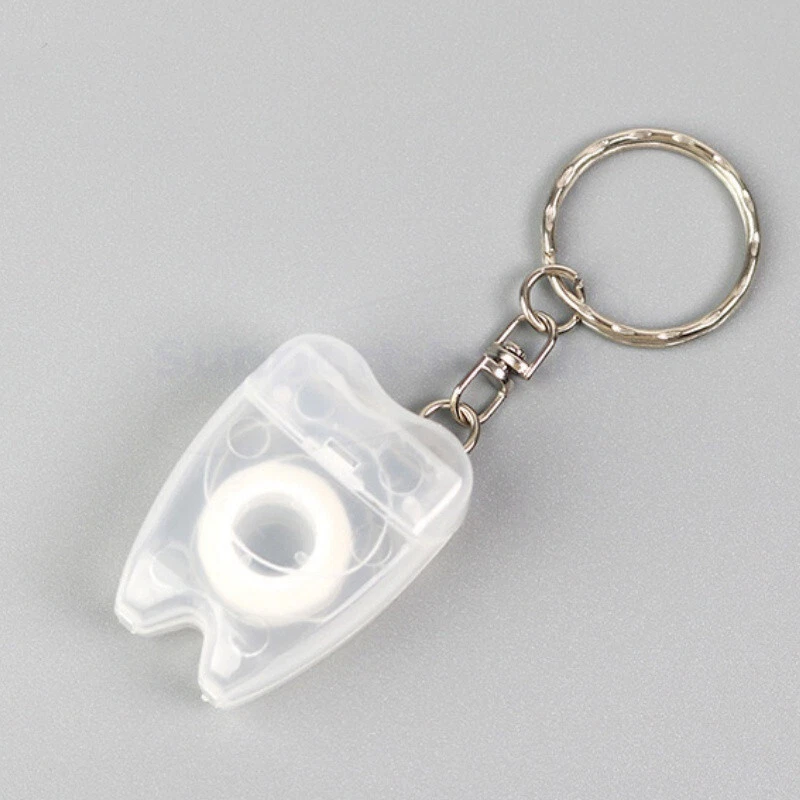 5x Mini llavero dental tipo hilo dental limpieza de dientes selección 15 m colores aleatorios Foto 1 de 4