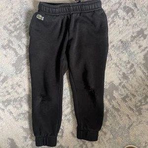 Schwarze Lacoste Jogginghose Jungen Größe 4 sehr schön!! - Bild 1 von 6