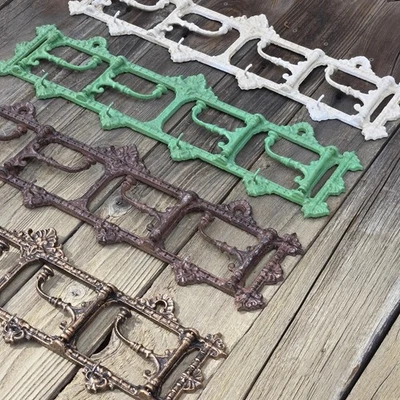 Gancho dobrável francês de ferro fundido – cabide vintage de parede para chapéus - Imagem 1 de 2