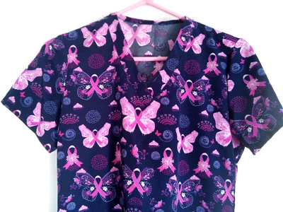 Size S navy blue scrub top, butterflies w/ pink breast cancer ribbon. Excellent - Image 1 of 3