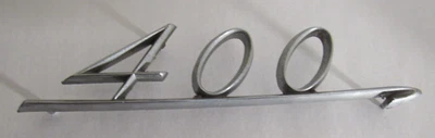 1961-62 AMC RAMBLER AMBASSADOR V8 400 CROSS COUNTRY WAGON EMBLEM SCRIPT 3460509 - Image 1 of 4
