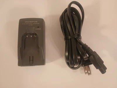 Base de cargador de batería de iones de litio original Olympus LI-10C para baterías LI-10B LI-12B Foto 1 de 3