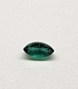 Marquise shaped emerald.  8x4mm natural green emerald with black carbon. - Picture 1 of 2