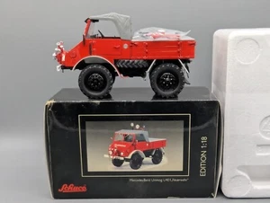 Modellautos 1:18 Schuco Mercedes Benz Unimog U401 Feuerwehr in OVP - Bild 1 von 15