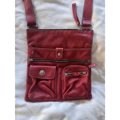 Bandolera Bandolera Roots Canada Cuero Rojo Tribu Venetian Village Foto 1 de 4