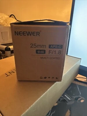Lente Neewer LS-25 - 25 mm APS-C F/1,8 Foto 1 de 4