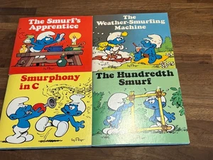 Schlumpf Mini Bilderbücher von Peyo 4er Set Taschenbuch 1980 1982 Schlumpf in der Luft - Bild 1 von 7
