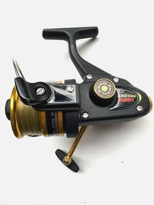 Carrete giratorio Penn 450SSg - cuerpo de grafito negro/dorado - ¡casi como nuevo! - Imagen 1 de 9