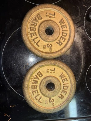 Par de pesos soldadores vintage dorados 7 1/2 lb Foto 1 de 4