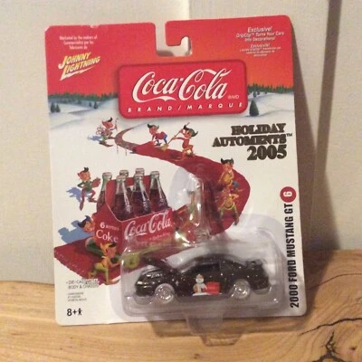 Coca Cola Holiday Automents 2000 Ford Mustang GT Johnny Lightning Diecast 1:64  - Image 1 of 4