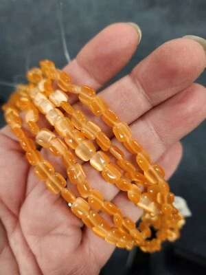 Cuentas de almohada cuadradas infladas de fibra óptica de vidrio ojo de gato naranja de 6 mm (60 piezas) Foto 1 de 2