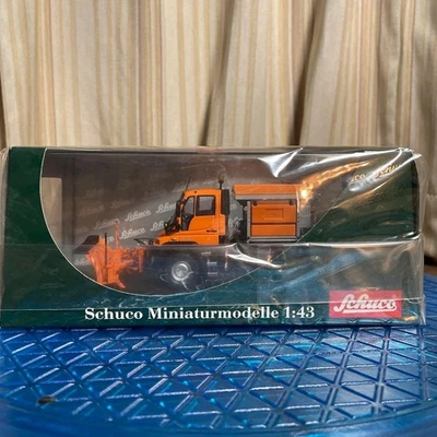 Modellino spazzaneve Schuco Unimog scala 1/43 camion pressofuso mai aperto - Immagine 1 di 4