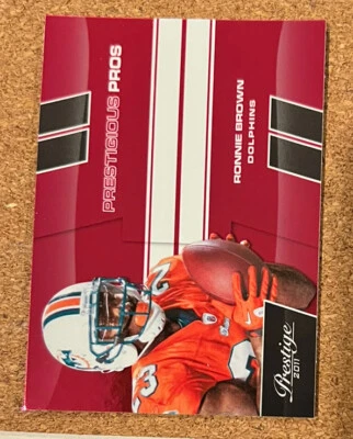 2011 Prestige Prestigious Pros Red Miami Dolphins Football Card #42 Ronnie Brown - Image 1 of 2