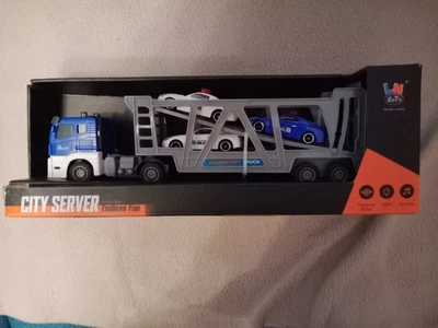 camion porte voiture a friction et lumiere 1/32 neuf - Photo 1/2