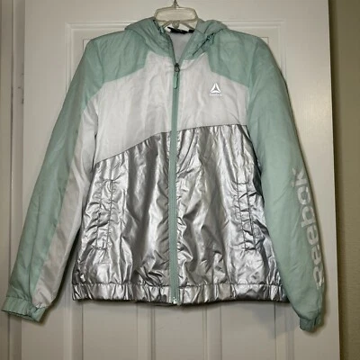 Cortavientos Reebok como nuevo/metálico/blanco forrado talla mediana atlético Foto 1 de 4