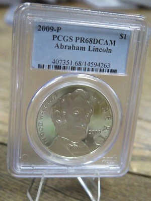 2009 P $1 ABRAHAM LINCOLN PCGS PR68DCAM PROOF COMMEMORATIVE SILVER DOLLAR - Image 1 of 3