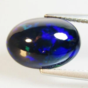 3.83Ct Natural Color Play Ethiopian Black Opal Oval Shape Cabochon Loose Gem VOD - Picture 1 of 4