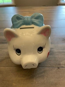 Cute ceramic piggy bank with a blue bow and pink cheeks by Nanco 6.5" x 5" x 5" - Picture 1 of 4