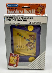LUCKY BALL Wind-Up - Jeu de poche à remontoir - Blue-Box 39002, 1980’s - Neuf - Imagen 1 de 5