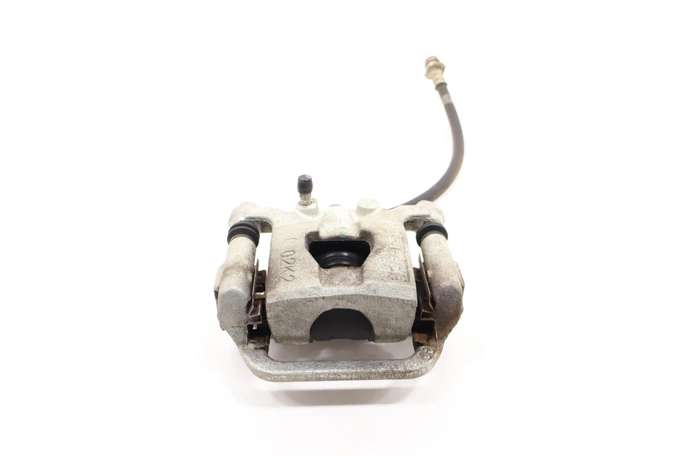 Pinza de freno de disco trasera derecha Nissan Altima 2019-2025 OEM Foto 1 de 4