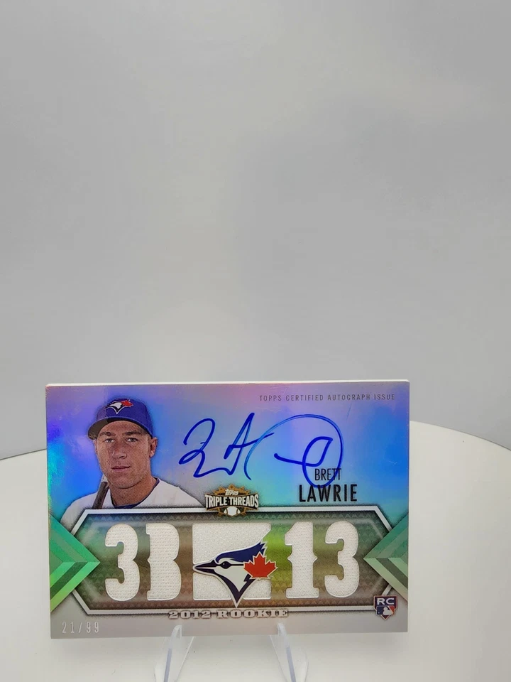 Topps Triple Threads Brett Lawrie #143 2012 con tarjeta automática, recuerdos 21/99 radiocontrol Foto 1 de 4