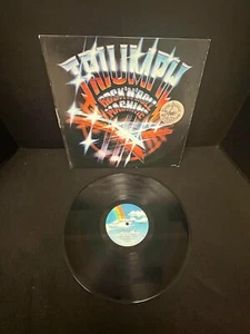 TRIUMPH ROCK'N'ROLL MACHINE BLACK VINYL LP - Picture 1 of 2