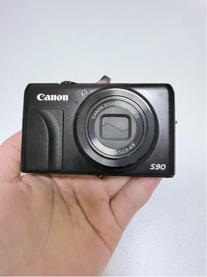 Cámara compacta Canon PowerShot S90 negra 10 MP f/2,0 apertura amplia poca luz profesional Foto 1 de 4