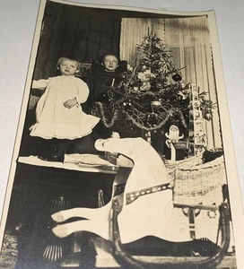 Seltene antike Weihnachtsbaum Schaukelpferd Urlaub Weihnachtsmann Echt Foto Postkarte RPPC - Bild 1 von 6