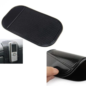 TAPPETINO IN SUPPORTO SILICONE ADESIVO ANTISCIVOLO CRUSCOTTO AUTO SMARTPHONE NEj - Foto 1 di 11