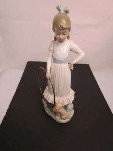NAO by Lladro figurine #0379 “My Dog Does Tricks” - Girl with Hoop & Puppy - Picture 1 of 12