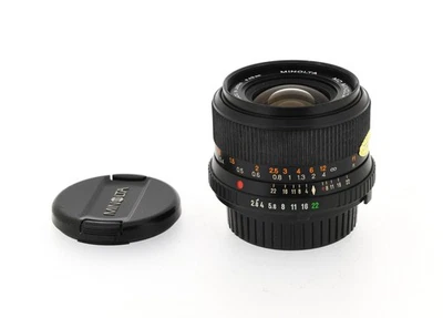 Minolta MD Celtic 28mm f/2.8 –  avec 2 bouchons – N°1063454 - Photo 1/4