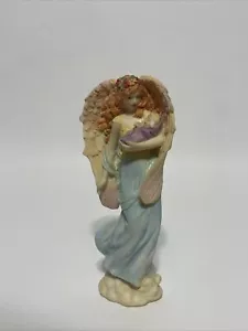 Engel hält ein Baby, gebeizte Figur - Bild 1 von 13