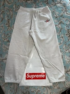 PANTALONES DEPORTIVOS SUPREME JORDAN (GRANDES) (GRIS CENIZA) FW24 PANTALONES HOLGADOS VAQUEROS TRACK - Imagen 1 de 22