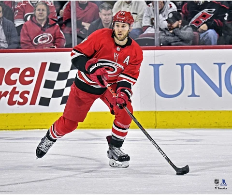 Jaccob Slavin Carolina Hurricanes Unsigned Red Jersey Skating Photograph Cover