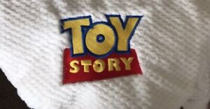 White Blanket With Toy Story Emblem