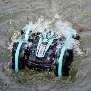 Remote controlled amphibious beach toy car rotates and flips over water and land