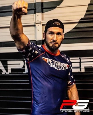 Camisa de compresión azul para hombre Petersons Grapplers Jiu Jitsu Rashguard L Foto 1 de 3