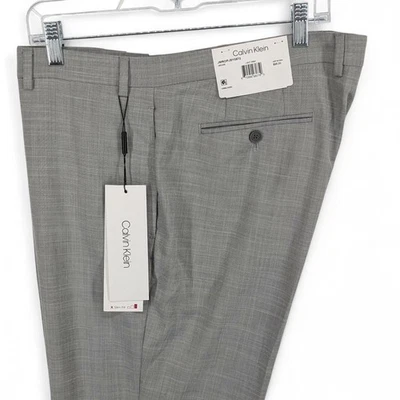 Traje de vestir Calvin Klein para hombre ajustado de lana elástico gris liso 33 x 32 Foto 1 de 4