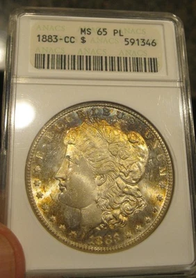 Dólar de plata Morgan 1883 CC - Antiguo soporte ANACS, MS 65 PL, tono colorido, 5137 Foto 1 de 4