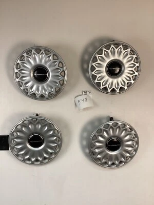 Tapacubos cubierta de rueda de 14" Plymouth Voyager Acclaim Sundance 1994-1995 OEM 4 Foto 1 de 4