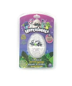 2X Hatchimals Bálsamo Labial Sabor Misterioso (Cáscara Blanca con Manchas Púrpura) - Imagen 1 de 3